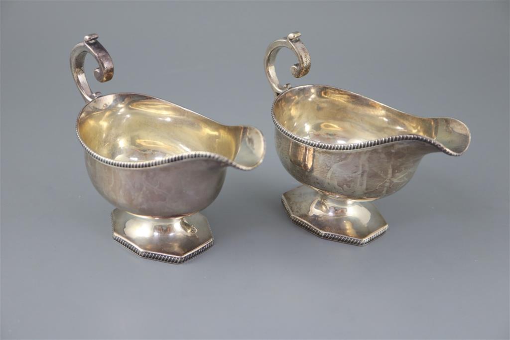 A pair of late Victorian silver pedestal sauceboats, by Roskell, Roskell & Hunt, 22oz.